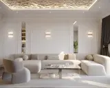 Elegancki salon z nowoczesnym sufitem. Luksusowy pomysł na sufit w salonie z oświetleniem tworzącym efekt fal.
